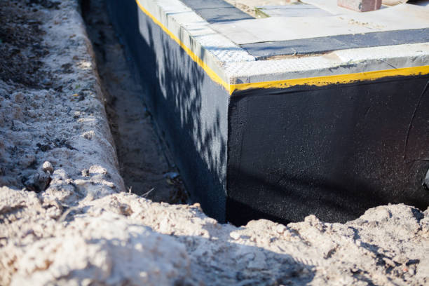 Professional Wet Basement Repair technician working in Santa Fe, TN